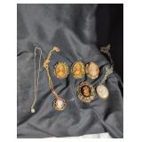 Costume jewelry brooches and necklaces lot.