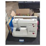 Sewing machine with accessories.