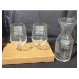 Coca-cola vase and pair of wine glasses.