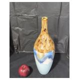 Hand painted ceramic vase.