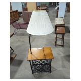 Vintage end table with a integrated lamp.