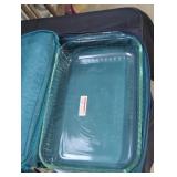 Portable Pyrex casserole carrier and dish.