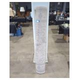 Rolled up brown,tan, blue area rug(63in width)