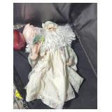 Santa clause and a dynasty doll lot.