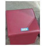 Small red 'leather' ottoman.
