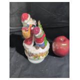 Holiday musical with revolving stand.