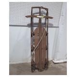Vintage lighting guider wooden snow sled.