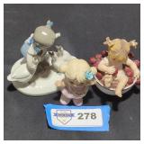 Trio of Porcelain figurines.