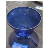 Blue hand-blown glass candy holder.