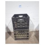 Pair of black crates.