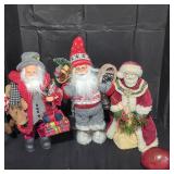 Trio of  Santa clause figurines lot.