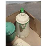 Metal jar with lid and metal pitcher.