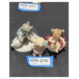 Trio of Porcelain figurines.