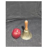 Vintage bell with wooden handle.