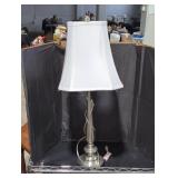 Brushed nickel bass table lamp.