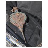 Vintage fire bellow and metal candle holder.