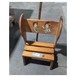 Raggedy Ann kids, wooden chair and cane.