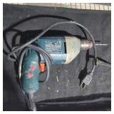 Black and decker electric power drill.