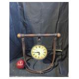 Hanging electric brass clock.