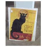 Black cat puzzle in plastic frame.