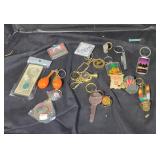 Vintage keychains and charms in ziplock bag lot.