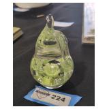 Clear and green glass pear paperweight.