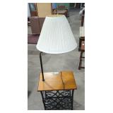 Vintage end table with a integrated lamp.