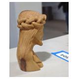 Wooden Jesus sculpture.