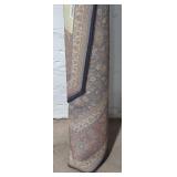 Traditional rolled up area rug(6