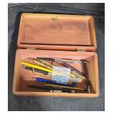 Small wooden box and pens lot
