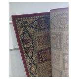 Rolled up area rug (63in Width)