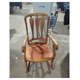 Wooden rocking chair.