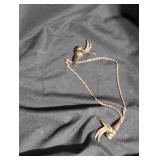 Vintage chatelaine brooch with two swallows.