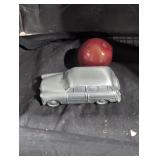 Vintage silver colored die cast bank.