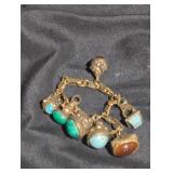 Vintage charm bracelet,Etruscan style metal.