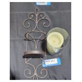 Wrought iron wall sconce with electric candle.