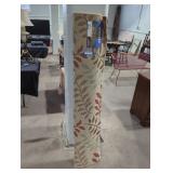 Chester rolled up area rug (5'3 by 7'3).