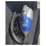 Shark extractor vacuum.