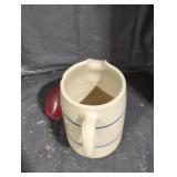 Ceramic pitcher.