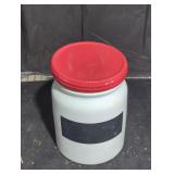 Rubber rimmed porcelain cookie jar.