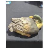 Wooden duck figurine.
