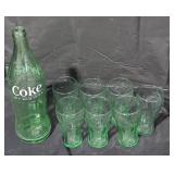 Vintage coca-cola glasses and bottle.