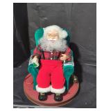 Santa read me a story figurine.