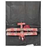 Handmade Coca-Cola biplane model.