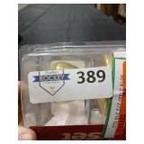 Kwikset Tylo Polished Brass Passage Door Knob Righ