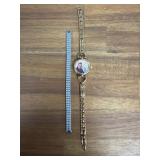 Wristwatch and bracelet.