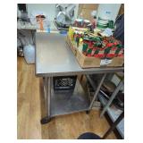 Rolling metal kitchen table