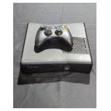 Xbox 360 and controller. No cords included.