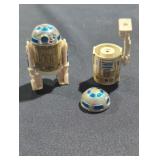 Pair of R2-D2 toys one is broken.