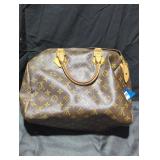 Louis Vuitton hand bag.